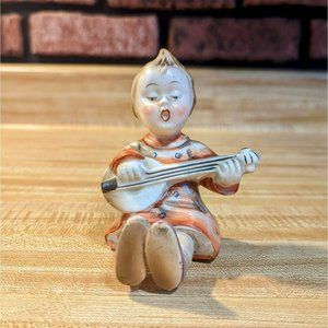 Vintage Hummel Style Girl Sitting‎ & Playing Lute With Orange Dress Figurine